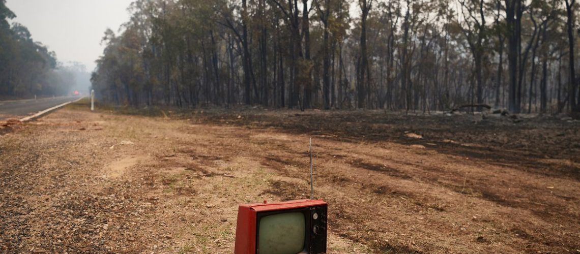 SYDNEY, AUSTRALIA - NOVEMBER 14: A dumped vintage TV remains as one of the only things intact along Putty Road after devastating fires tore through areas near Colo Heights on November 14, 2019 in Sydney, Australia. Bushfires from the Gospers Mountain bushfire continue to burn. An estimated million hectares of land has been burned by bushfire following catastrophic fire conditions - the highest possible level of bushfire danger. While conditions have eased, fire crews remain on high alert as dozens of bushfires continue to burn. A state of emergency was declared by NSW Premier Gladys Berejiklian on Monday 11 November and is still in effect, giving emergency powers to Rural Fire Service Commissioner Shane Fitzsimmons and prohibiting fires across the state. (Photo by Brett Hemmings/Getty Images)